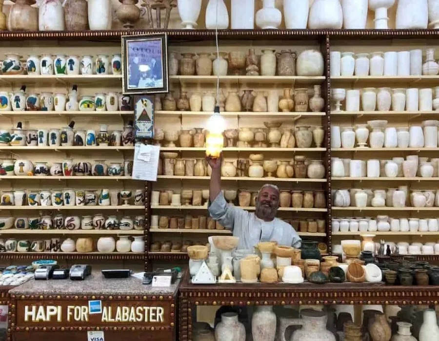 Alabaster Egyptian statues and carvings at Luxor West Bank artisan workshop — top souvenirs to buy in Egypt